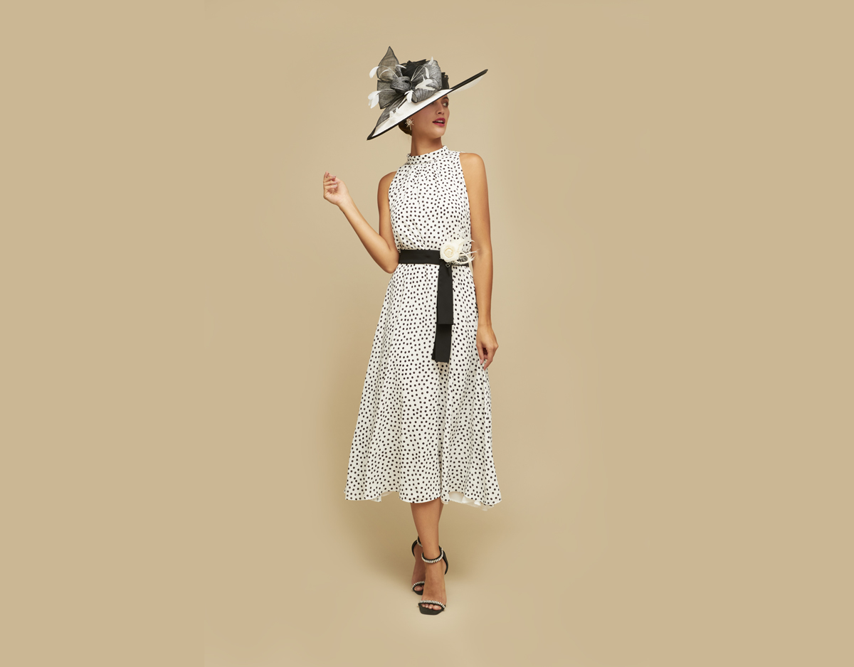 Claudia C Vestido spotted black and white dress with black and white hat. Dress for the races.