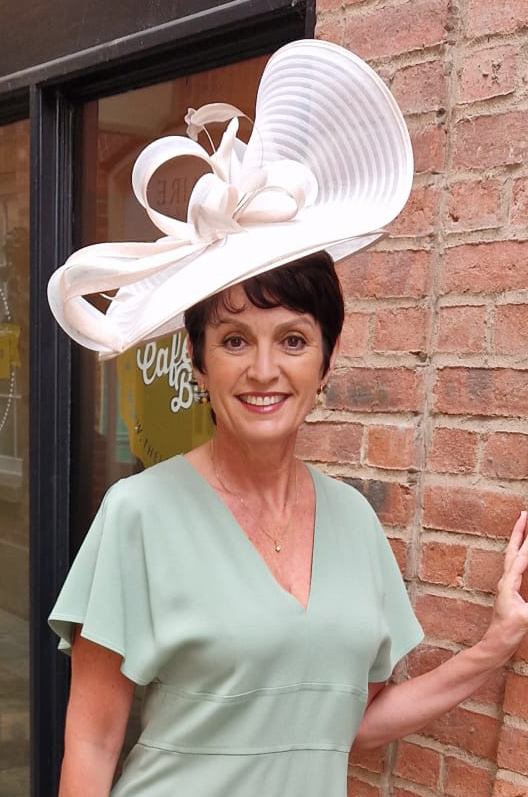 White statement hat for a wedding, the races or occasion wear