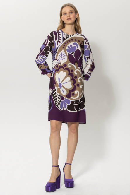 Model wearing the Luisa Cerano floral purple rain graphic dress