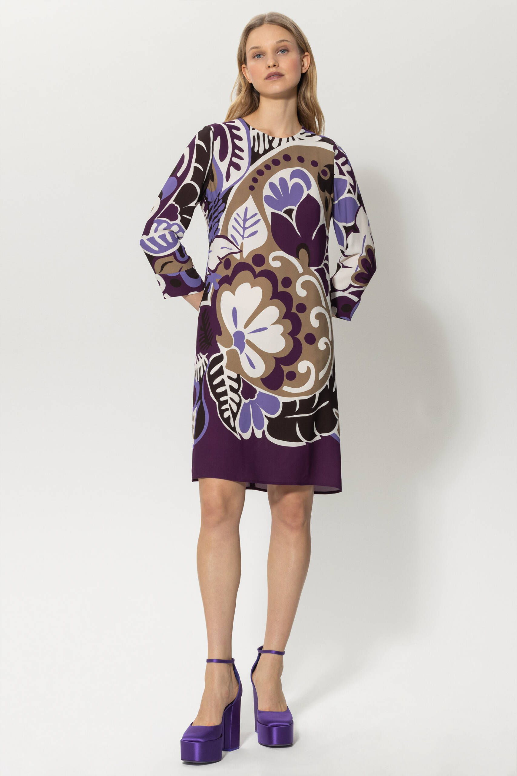 Model wearing the Luisa Cerano floral purple rain graphic dress