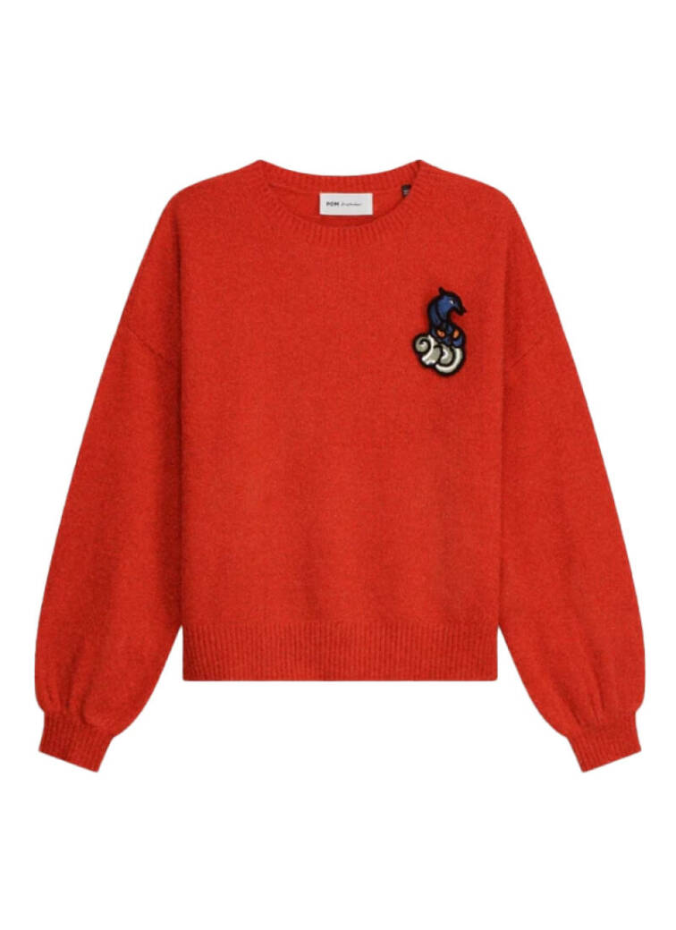 Red and motif Pom knitwear for Autumn 23
