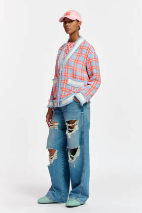 Checked cardigan and ripped jeans
